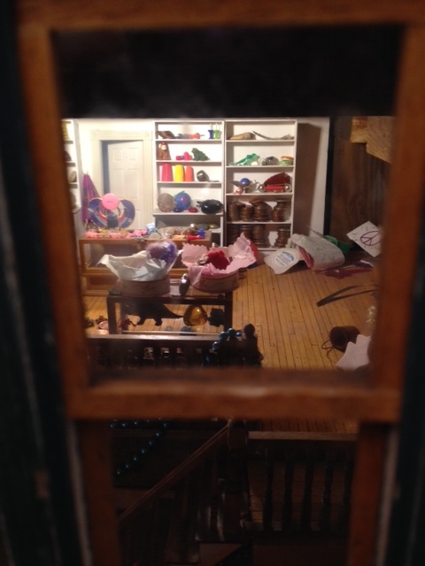 This is the view from the fairy window into a tiny fairy store. It's a very close replica of the actual store where the fairy door is located.